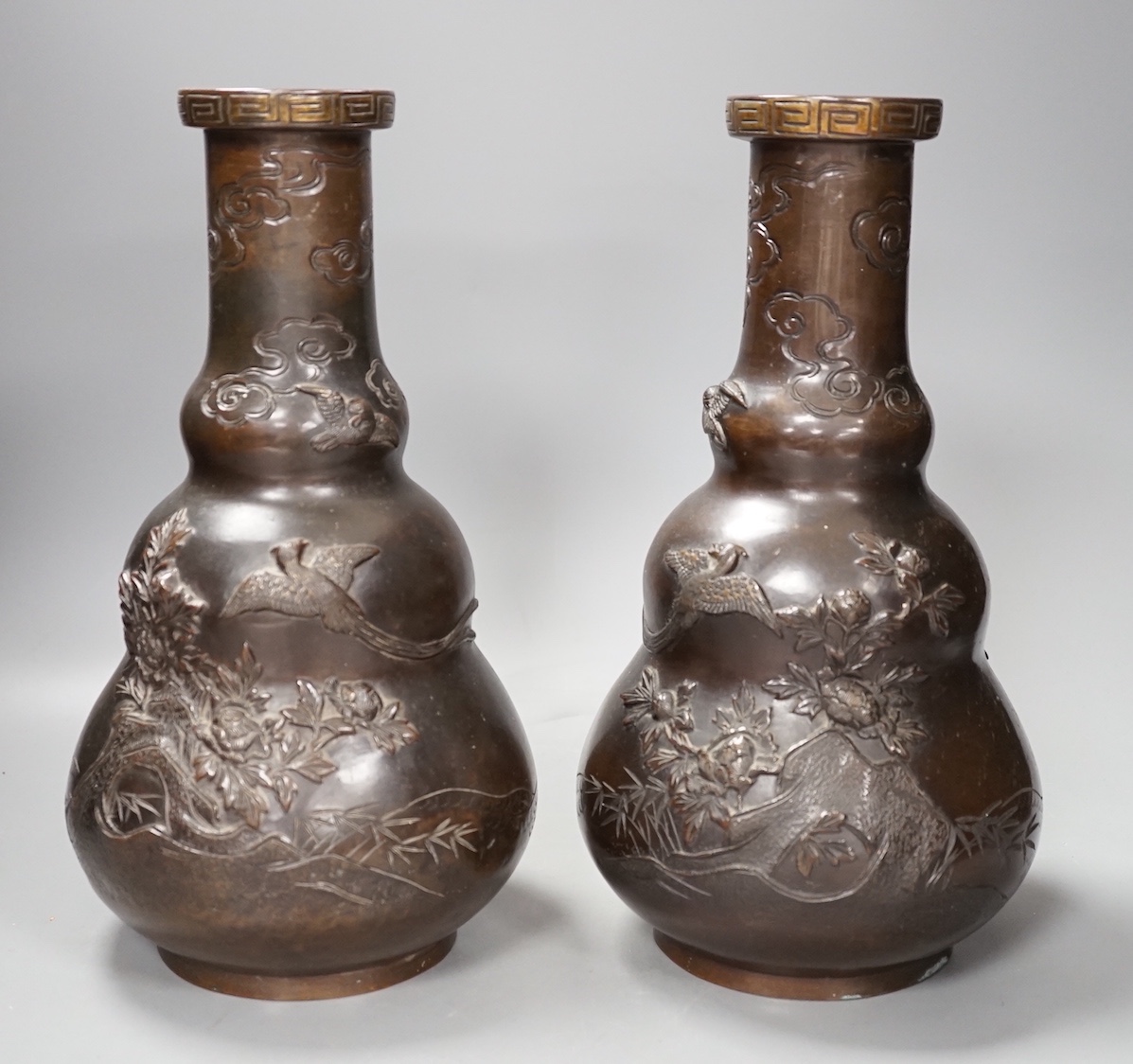 A pair of Japanese Meiji bronze vases. 30cm